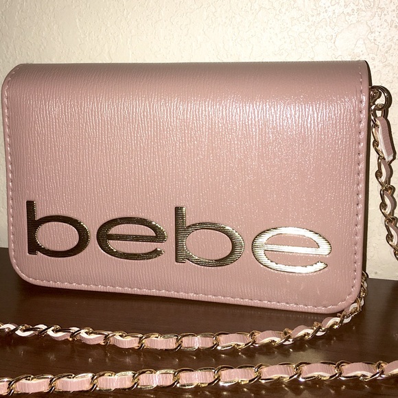 bebe Handbags - NWT mini bebe pink crossbody bag